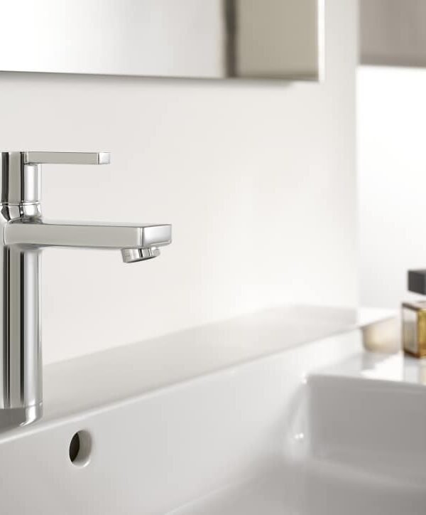 Shop the Roca Naia medium-height basin mixer in chrome: a minimalist geometric design with an energy-saving cold start and click-clack waste included.